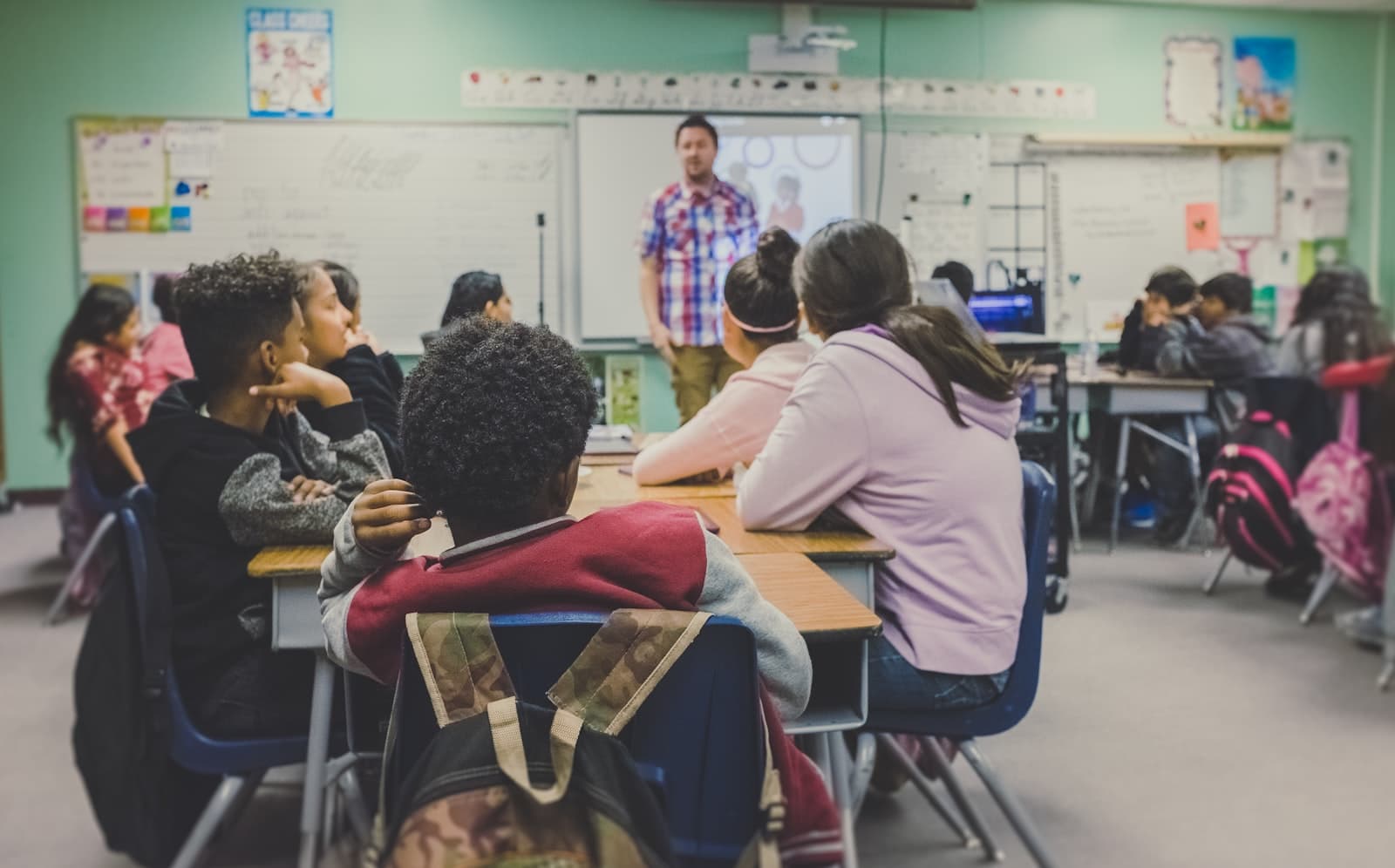 Young students in a classroom working together